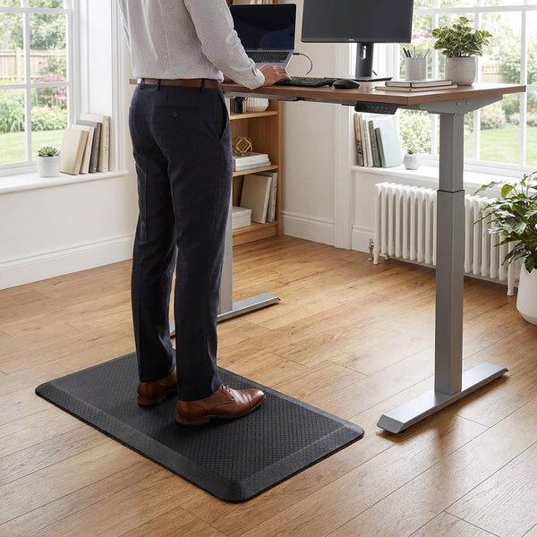 Anti-fatigue mat at UK home office standing desk setup