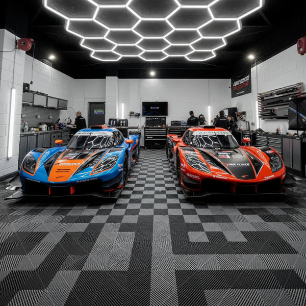 Vented floor tiles in F1 motorsport racing team garage UK