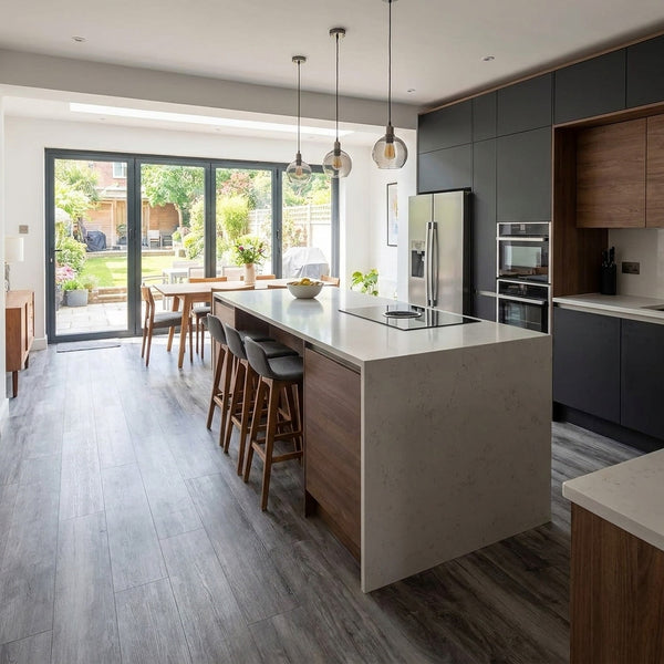 Self-adhesive wood effect vinyl planks installed in UK open-plan kitchen diner