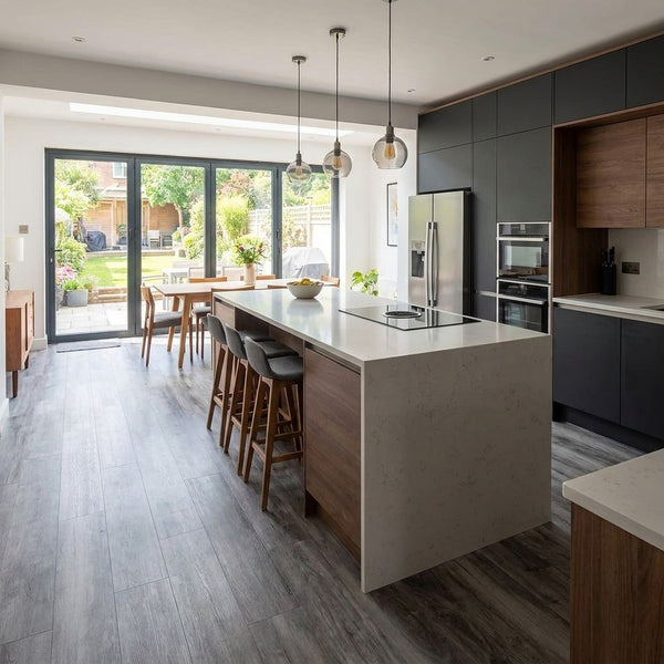 Self-adhesive wood effect vinyl planks installed in UK open-plan kitchen diner