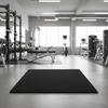 MatPro 11mm Heavy Duty Gym Rubber Mats installed in commercial UK gym with squat racks