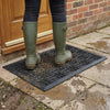 Heavy duty brick rubber scraper mat - muddy boots at UK back door