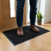 Black Washable Mat - in use at UK home entrance