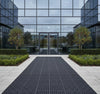 Rubber grass mats at commercial building entrance - business anti-slip pathway