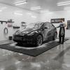 Wash bay rubber matting at UK car valeting centre - professional car wash drainage floor