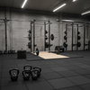 MatPro 43mm Anti-Shock Rubber Tile at UK Olympic lifting platform with barbells