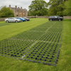 Black ground reinforcement grid used for grass overflow car park at UK estate