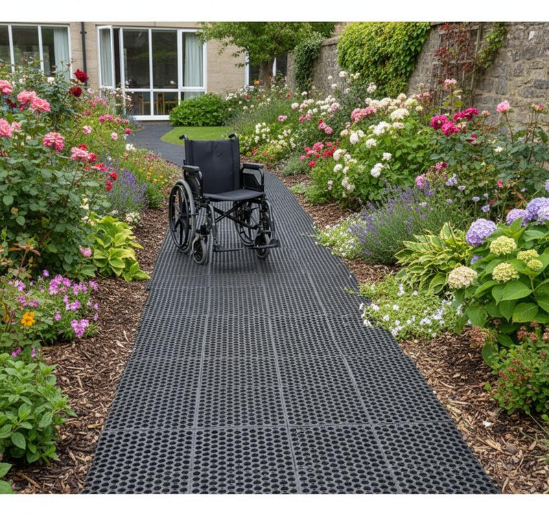 Rubber grass mats creating wheelchair accessible pathway - care home garden access