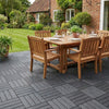 Composite WPC deck tiles on UK garden patio with outdoor dining set