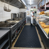 Commercial kitchen drainage mat in UK fish and chip shop - oil resistant anti-fatigue matting