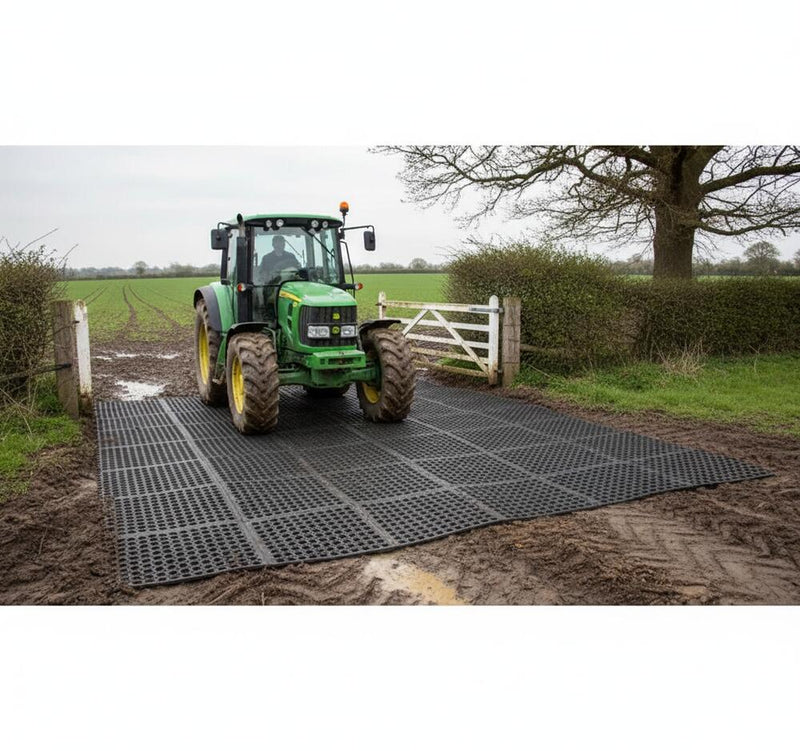 Rubber grass mat roll at farm entrance - heavy duty ground protection