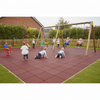 SafeStep playground rubber safety mats under swing set at UK nursery garden