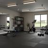 Black interlocking puzzle mats in garage fitness area - modular exercise flooring