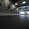 SafeStep Parkour 63mm safety flooring under bouldering wall in UK climbing centre