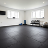 Black interlocking puzzle mats in home fitness room - 10mm rubber flooring