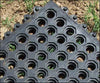 Rubber grass mat close-up hexagonal drainage holes