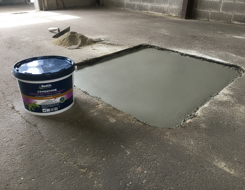 Rapid Setting Cement 1kg beside completed concrete floor repair in agricultural setting