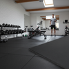 MatPro 20mm Heavy Duty Rubber Tiles in home gym basement with weight rack