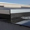 Raised kerb edge detail flat roof drainage EPDM membrane