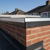EPDM wall flashing trim installed at dormer roof wall abutment UK
