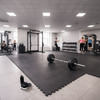 GymGuard 17mm Solid Rubber Gym Mat 100cm x 100cm - Commercial Gym Setting