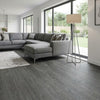 Dark grey peel and stick vinyl planks in UK open plan living room