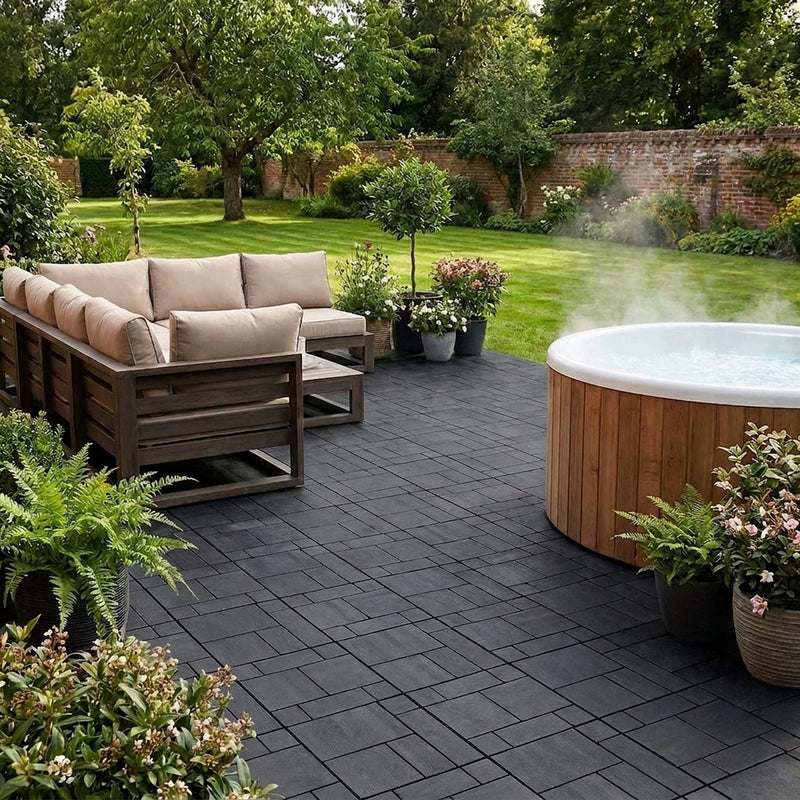 Graphite interlocking recycled tyre deck tiles on UK patio