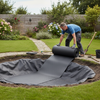 Worker Installing EPDM Rubber as Pond Liner - UV Resistant UK