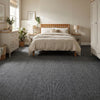 Carpet tiles installed in UK home bedroom with double bed