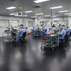 Anti-static rubber mat in electronics manufacturing facility - ESD safe workstation