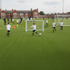 Football artificial grass school pitch UK students playing