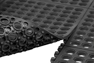 Black Anti-Fatigue Tile with Drainage Holes for Enhanced Comfort