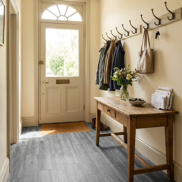 Grey wood effect vinyl tiles in UK hallway entrance