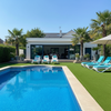 Non-slip swimming pool surround artificial grass installed around luxury UK pool