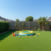 Non-slip artificial grass around family pool area UK garden