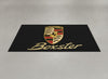 Porsche Boxster showroom parking rug laid on light grey polished concrete