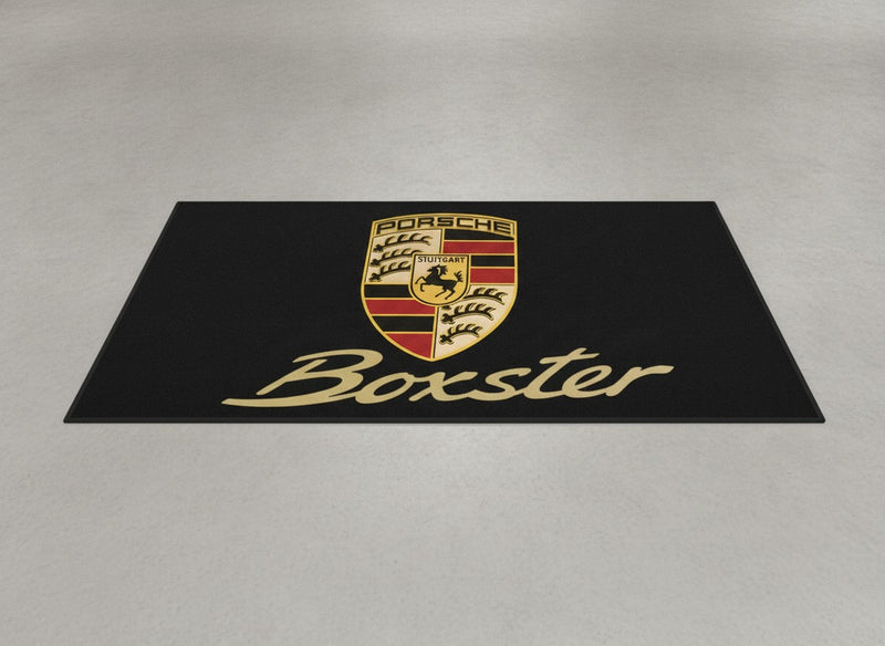 Porsche Boxster showroom parking rug laid on light grey polished concrete