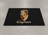 Porsche Cayman showroom parking rug laid on light grey polished concrete