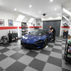 PVC interlocking garage floor tiles in professional detailing workshop UK