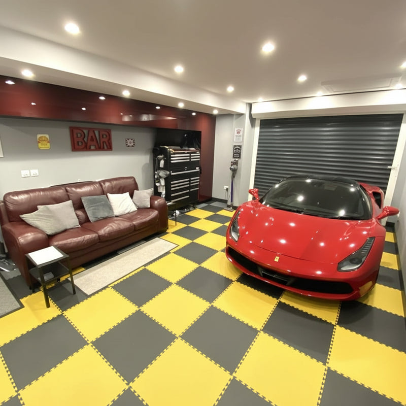 Racing yellow PVC garage floor tiles in professional detailing bay