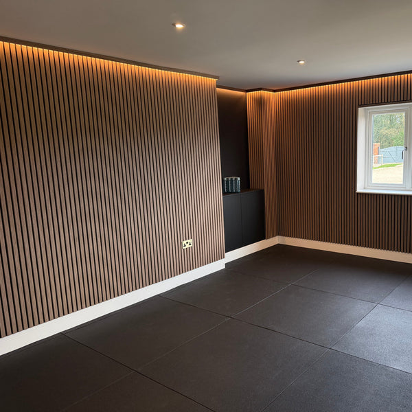 20mm MatPro Rubber Gym Flooring Tile installed in modern gym room — 1m x 1m black SBR rubber tiles