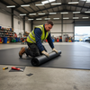 Workshop Installation - Rubber Sheet Flooring Being Laid