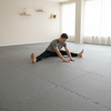Martial arts training on grey interlocking EVA foam exercise mats 20mm thick