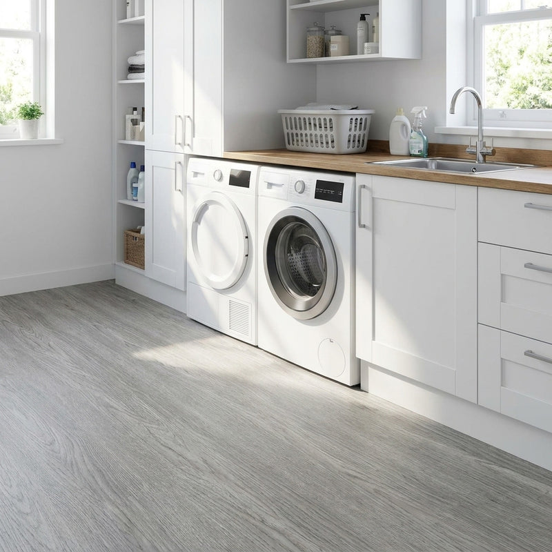 Washed grey self-adhesive vinyl planks in UK utility room
